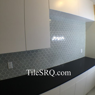 Walker Zanger ceramic tiles on laundry room backsplash.
