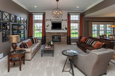 Inspiration for a mid-sized transitional open concept carpeted family room remodel in Other with gray walls, a standard fireplace and a wood fireplace surround