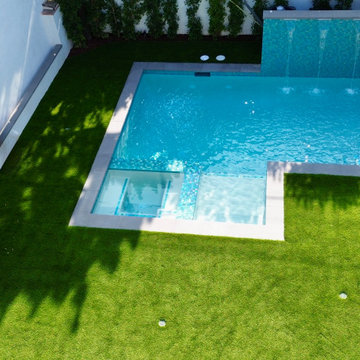 Morisson pool and spa raised wall with sheer decent