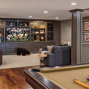 Transitional Basement with Built-In Entertainment Wall & Game Area