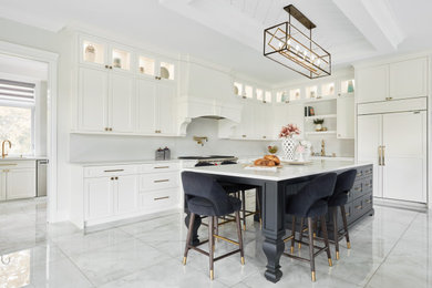 Design ideas for a mid-sized transitional l-shaped eat-in kitchen in Toronto with an undermount sink, flat-panel cabinets, white cabinets, quartz benchtops, white splashback, engineered quartz splashback, panelled appliances, porcelain floors, with island, white floor and white benchtop.