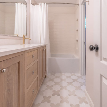 Playful Guest Bath Remodel with Fun Tile and Mixed Metals