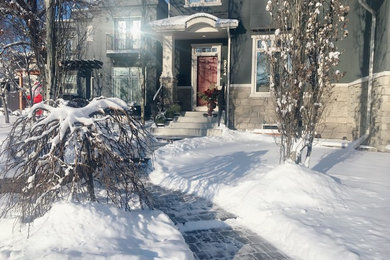 Mid-sized craftsman blue two-story stucco duplex exterior idea in Calgary with a hip roof and a shingle roof
