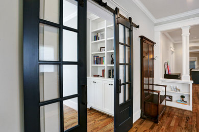 Home office - transitional home office idea in Houston