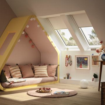 Chambre d'enfant rose pastel avec lit cabane dans les combles