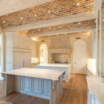 White Pearl quartzite kitchen- Bella Custom Homes