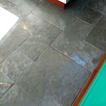 Raspberry Stained Flagstone Floor Cleaned and Sealed in Dursley