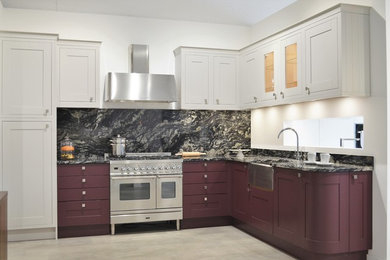 Design ideas for a medium sized classic l-shaped enclosed kitchen in London with a built-in sink, beaded cabinets, granite worktops, multi-coloured splashback, integrated appliances, laminate floors, no island and grey floors.