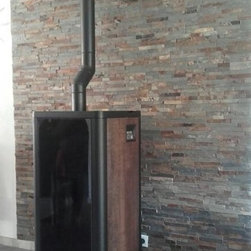 INSTALLATIONS POELES A GRANULES RIKA - Freestanding Stoves