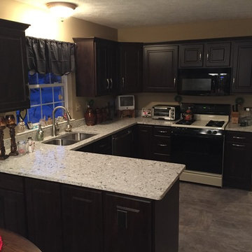 Cabinet refacing--chocolate with Quartz countertop