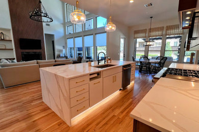 Example of a large minimalist l-shaped light wood floor and beige floor open concept kitchen design in Dallas with a single-bowl sink, flat-panel cabinets, medium tone wood cabinets, quartz countertops, black backsplash, mosaic tile backsplash, stainless steel appliances, an island and white countertops