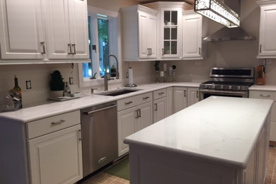 White Quartz and White Kitchen Cabinets