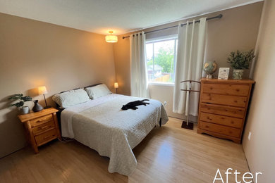Example of a master bedroom design in Other with beige walls