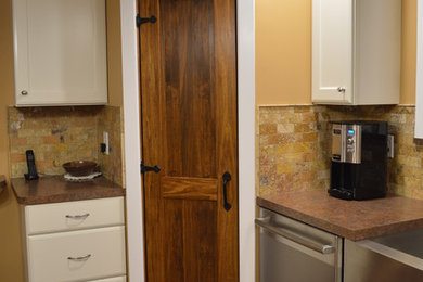 Ralston Chiffon cabinets with custom laminate counter tops and tile backsplash