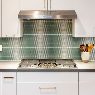 Bronze Pulls Warm Up a Cool Kitchen Palate