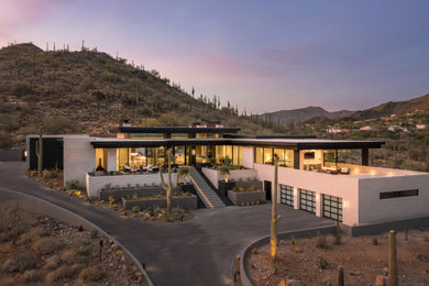 Example of a minimalist exterior home design in Phoenix