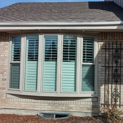 Crestview Shutters on Bow Window - Interior Shutters