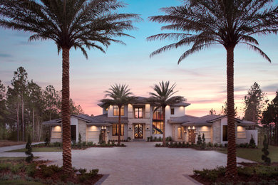 Huge tuscan home design photo in Orlando