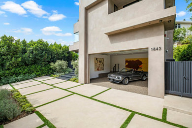 Example of a minimalist two-car garage design in Los Angeles