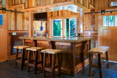 Inspiration for a large rustic seated home bar remodel in Seattle