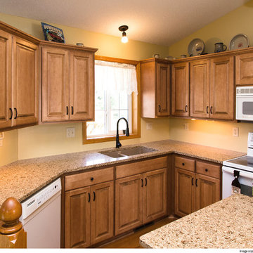 Door style: Covington | Species: maple | Finish: Taupe