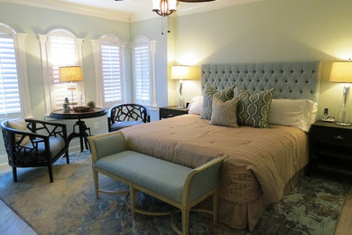 Inspiration for a mid-sized coastal master porcelain tile bedroom remodel in Miami with gray walls