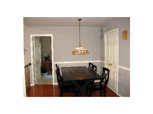 Dining Room Next to Kitchen and Tables