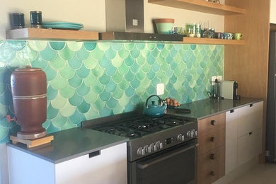 Example of a beach style kitchen design