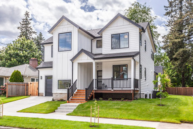 Inspiration for a mid-sized cottage white three-story concrete fiberboard exterior home remodel in Portland