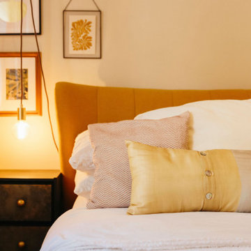 Warm and cosy yellow bedroom