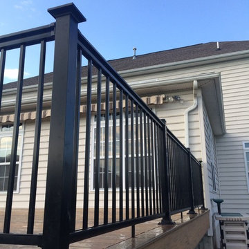 Timbertech legacy deck with aluminum rails with lighted post caps.