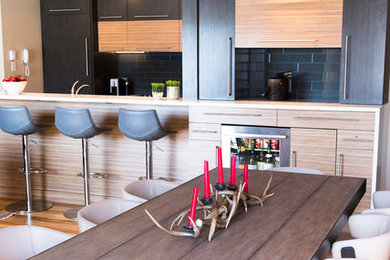 Mid-sized trendy medium tone wood floor and beige floor great room photo in Denver with beige walls