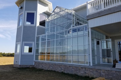 Example of a large classic sunroom design in Chicago