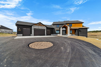 Example of an exterior home design in Denver