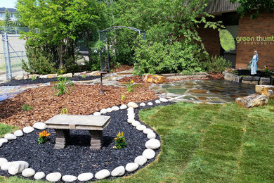 Inspiration for a rustic courtyard formal garden in Edmonton.