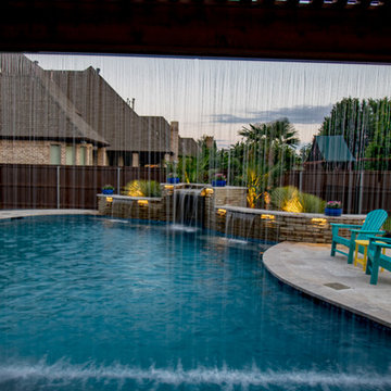 Transitional Curved Cool Pool with Amazing Water Features