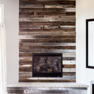 Design ideas for an expansive country look-out basement in Salt Lake City with white walls, carpet and a standard fireplace.