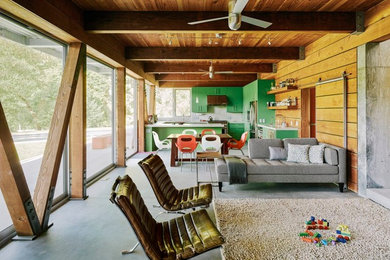 Trendy open concept concrete floor living room photo in San Francisco