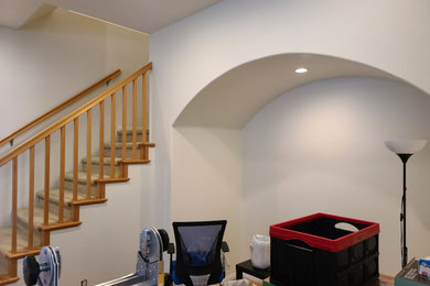 Example of a minimalist family room design in San Diego