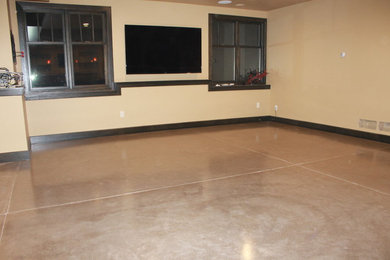 Inspiration for a large walk-out basement in Minneapolis with concrete floors.