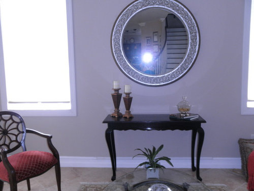 What Do I Put Under This Large Round Mirror