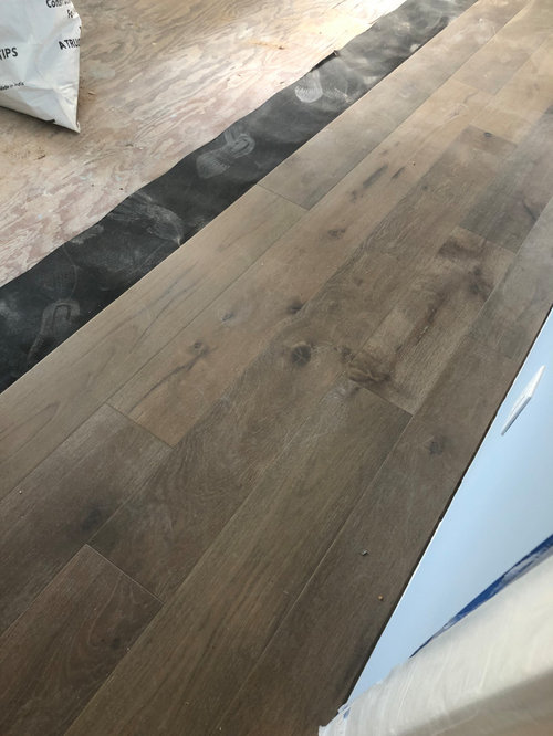 Stair treads and banister stain color should it match the floor?