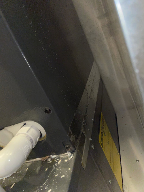 Air handler is “sweating” and causing puddles. Incorrectly sealed?
