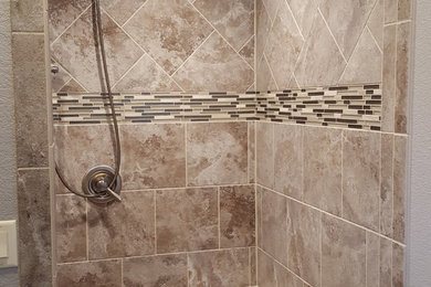 Example of a transitional bathroom design in Other