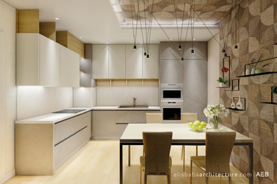 Modelo de cocinas en L contemporánea abierta con armarios con paneles lisos y salpicadero blanco