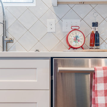 Close-Up of Kitchen Sink and Bold Red Accents