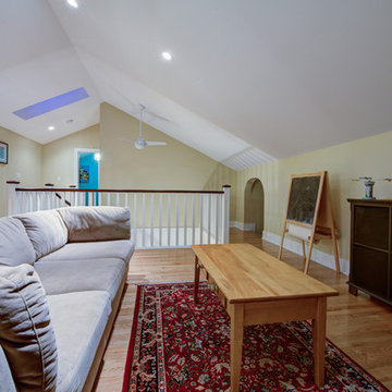Trendy Attic Development in a 1926 Home