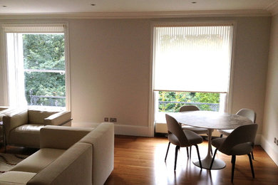 Photo of a large contemporary formal open plan living room in London.