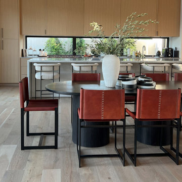 'Umbra' Black Ash Fluted Oval Dining Table w/ Three Pedestal Bases