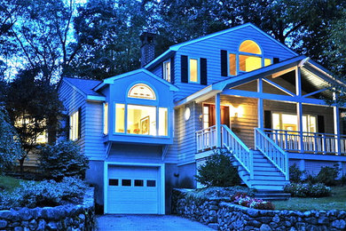Example of a mid-sized arts and crafts gray two-story wood exterior home design in Boston